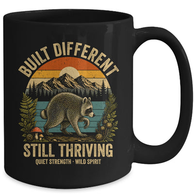 Built Different Still Thriving Raccoon Funny Vintage Mug | siriusteestore