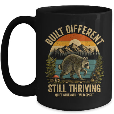 Built Different Still Thriving Raccoon Funny Vintage Mug | siriusteestore