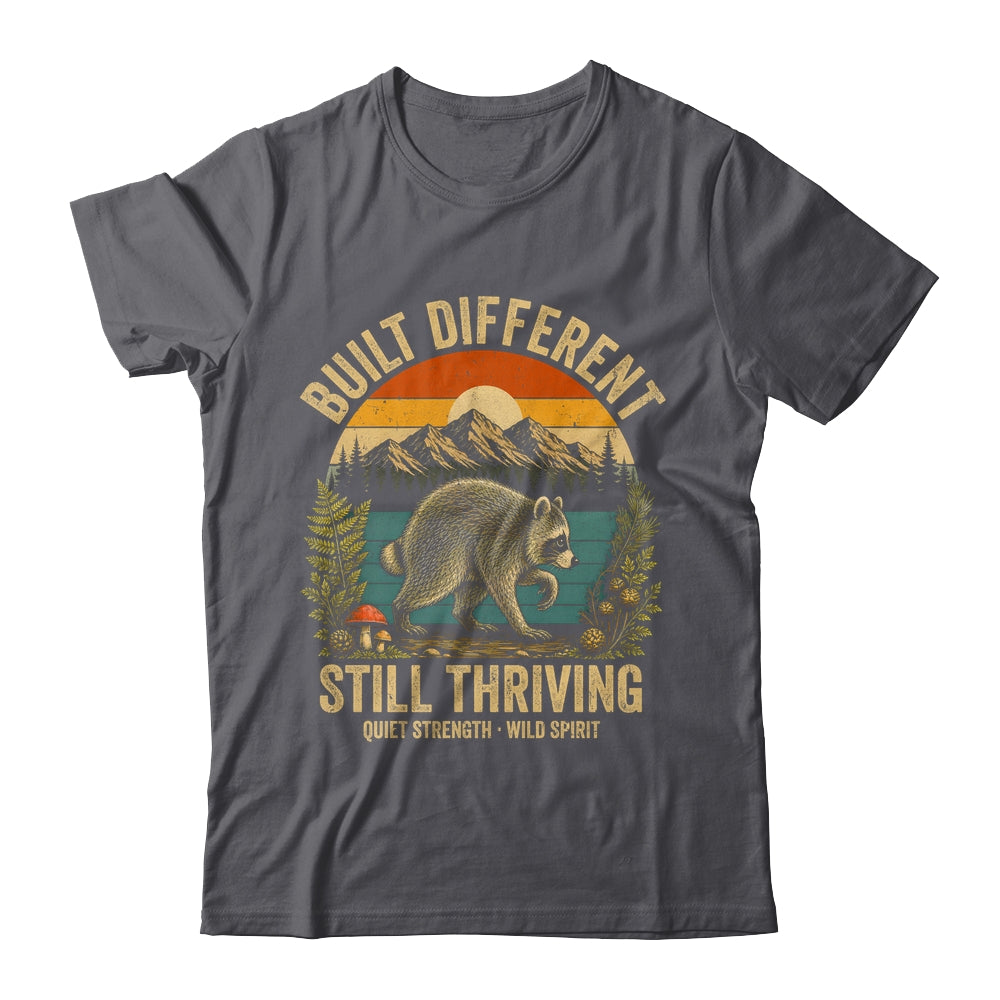Built Different Still Thriving Raccoon Funny Vintage Shirt & Tank Top | siriusteestore