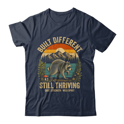 Built Different Still Thriving Raccoon Funny Vintage Shirt & Tank Top | siriusteestore