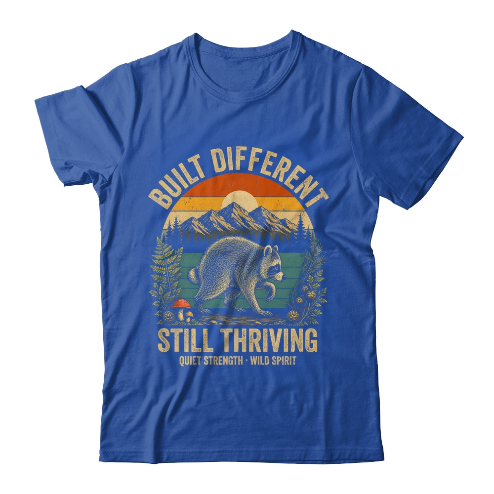 Built Different Still Thriving Raccoon Funny Vintage Shirt & Tank Top | siriusteestore
