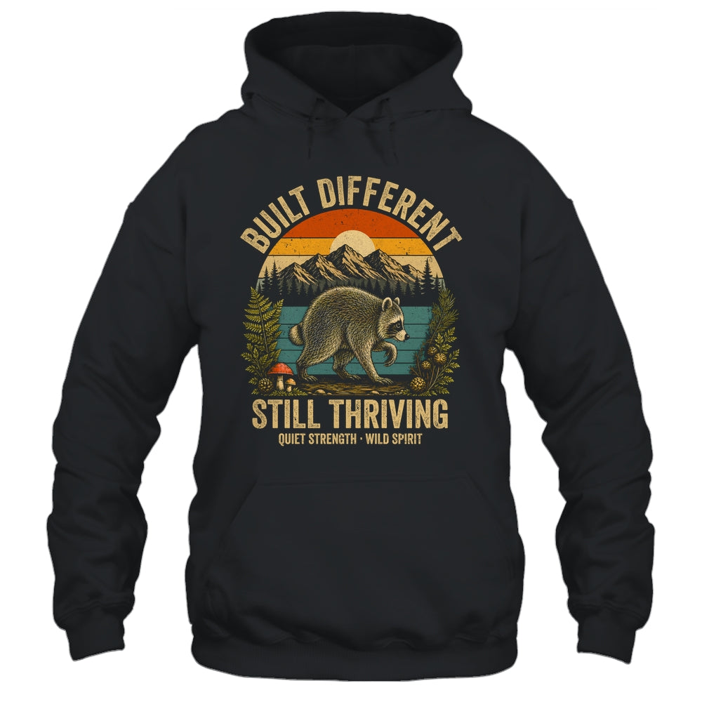 Built Different Still Thriving Raccoon Funny Vintage Shirt & Tank Top | siriusteestore