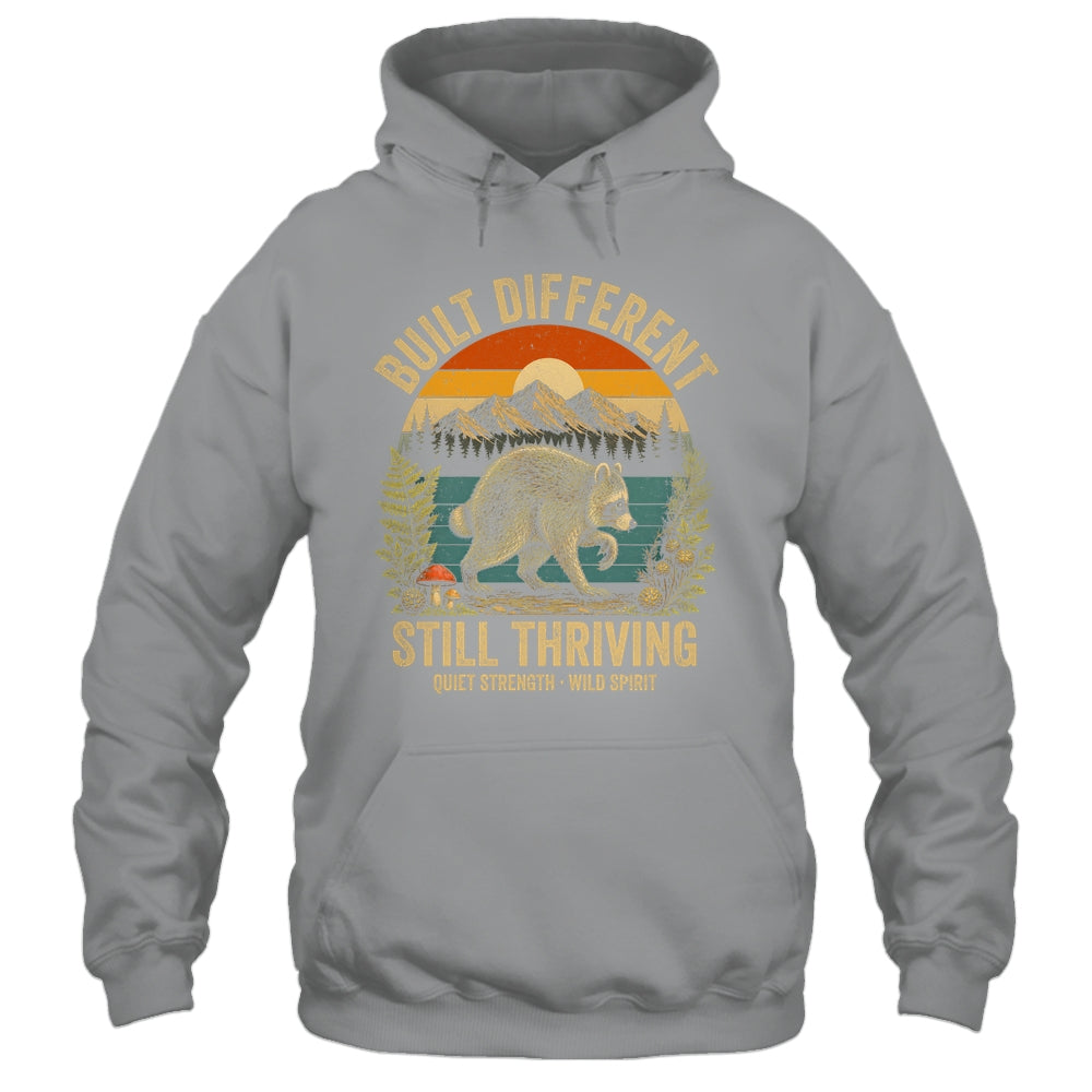 Built Different Still Thriving Raccoon Funny Vintage Shirt & Tank Top | siriusteestore