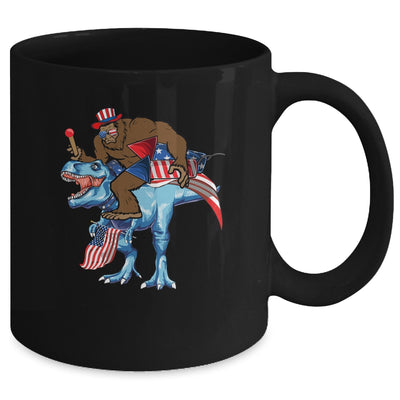 Bigfoot riding Dinosaur USA Flag 4th Of July America Mug | siriusteestore