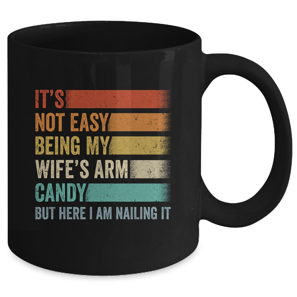 Its Not Easy Being My Wifes Arm Candy But Here I Am Nailing Mug | siriusteestore