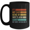 Its Not Easy Being My Wifes Arm Candy But Here I Am Nailing Mug | siriusteestore